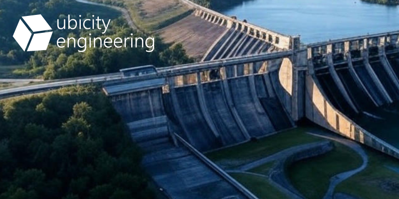 wind turbine with sunset, plus cubic logo of ubicity